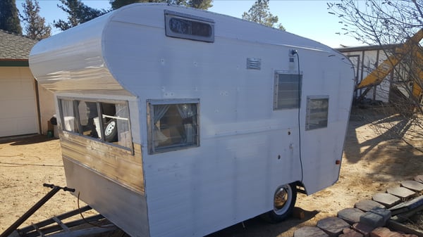 My favorite hobby is camping with my restored vintage trailer!!