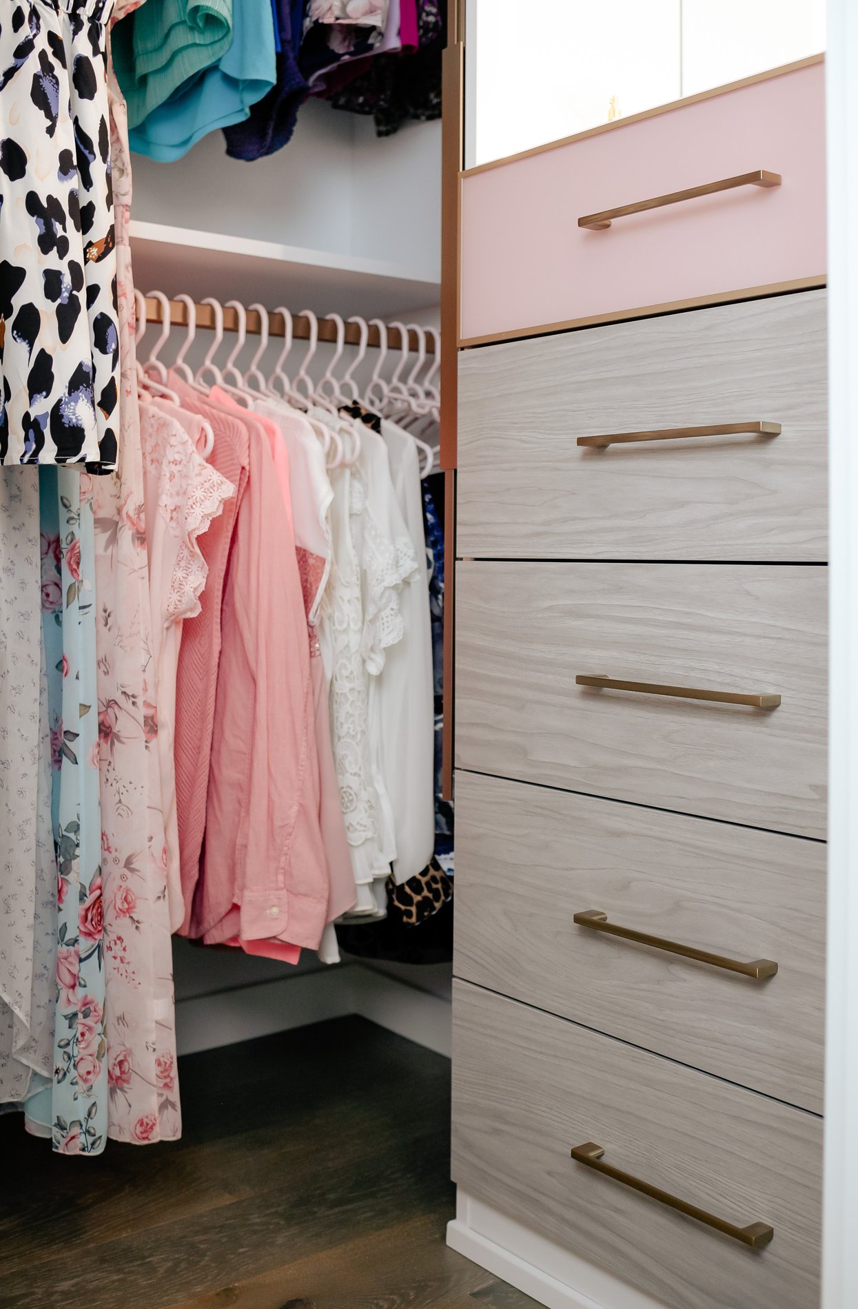 Bank of Drawers in Walk-In Closet close up of a bank of drawers showing off the hardware and grey wood tones by California Closets Vancouver, British Columbia.