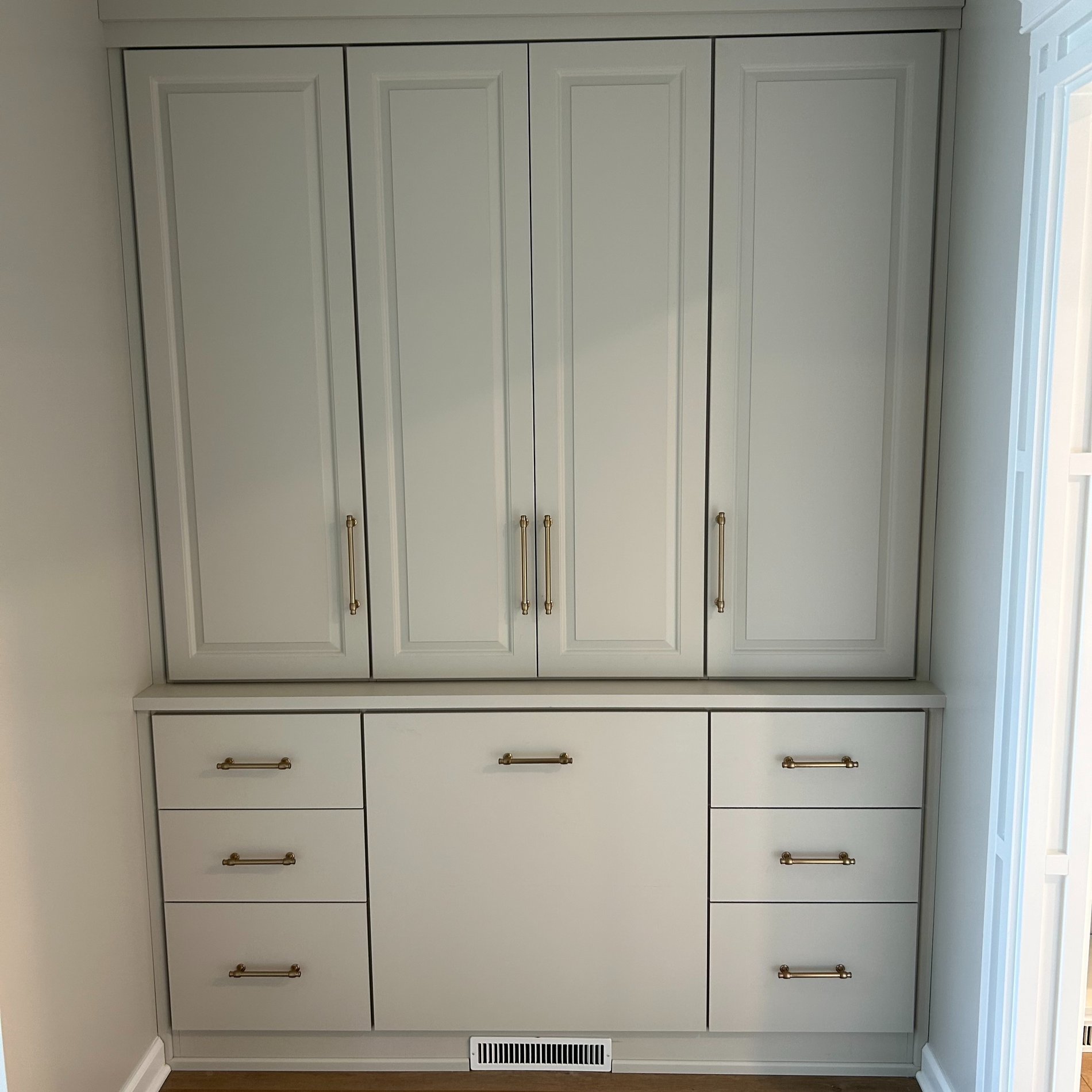 Custom Built In Storage Custom built in storage with drawers and cabinets.