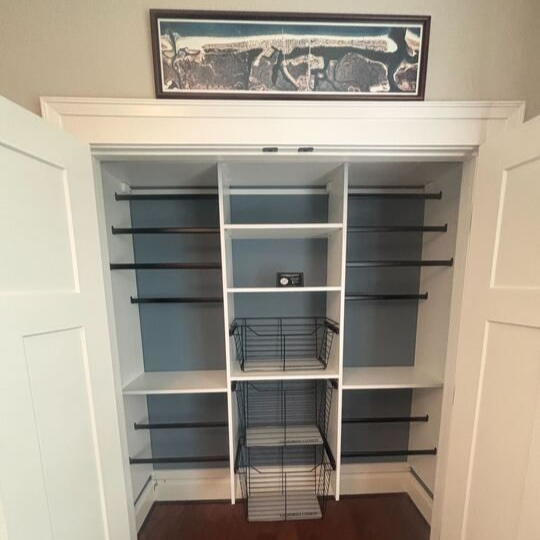Function, Framed in Style Wilmington - Custom closets - Reach-in closet with white shelving, hanging rods, and pull-out wire baskets.