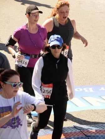 Mary Shales participating in the Allstate Sugar Bowl Crescent City Classic 10K run/walk in April 2019