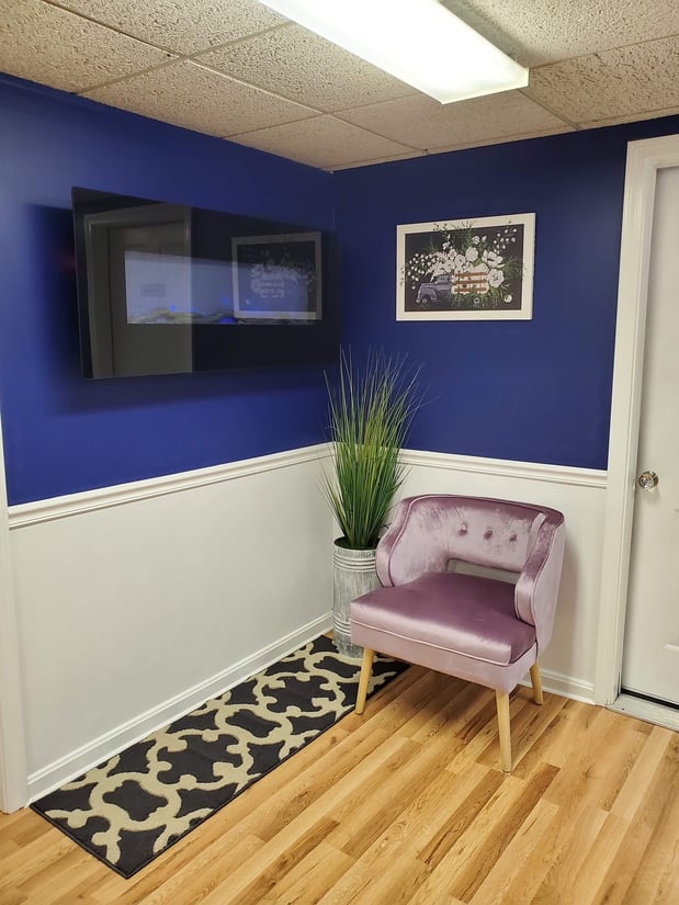 Waiting room with fireplace