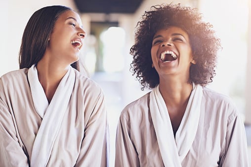 girls-graduate-laughing