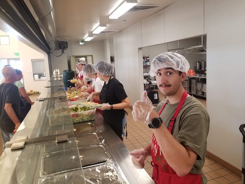 Serving lunch at the homeless shelter.