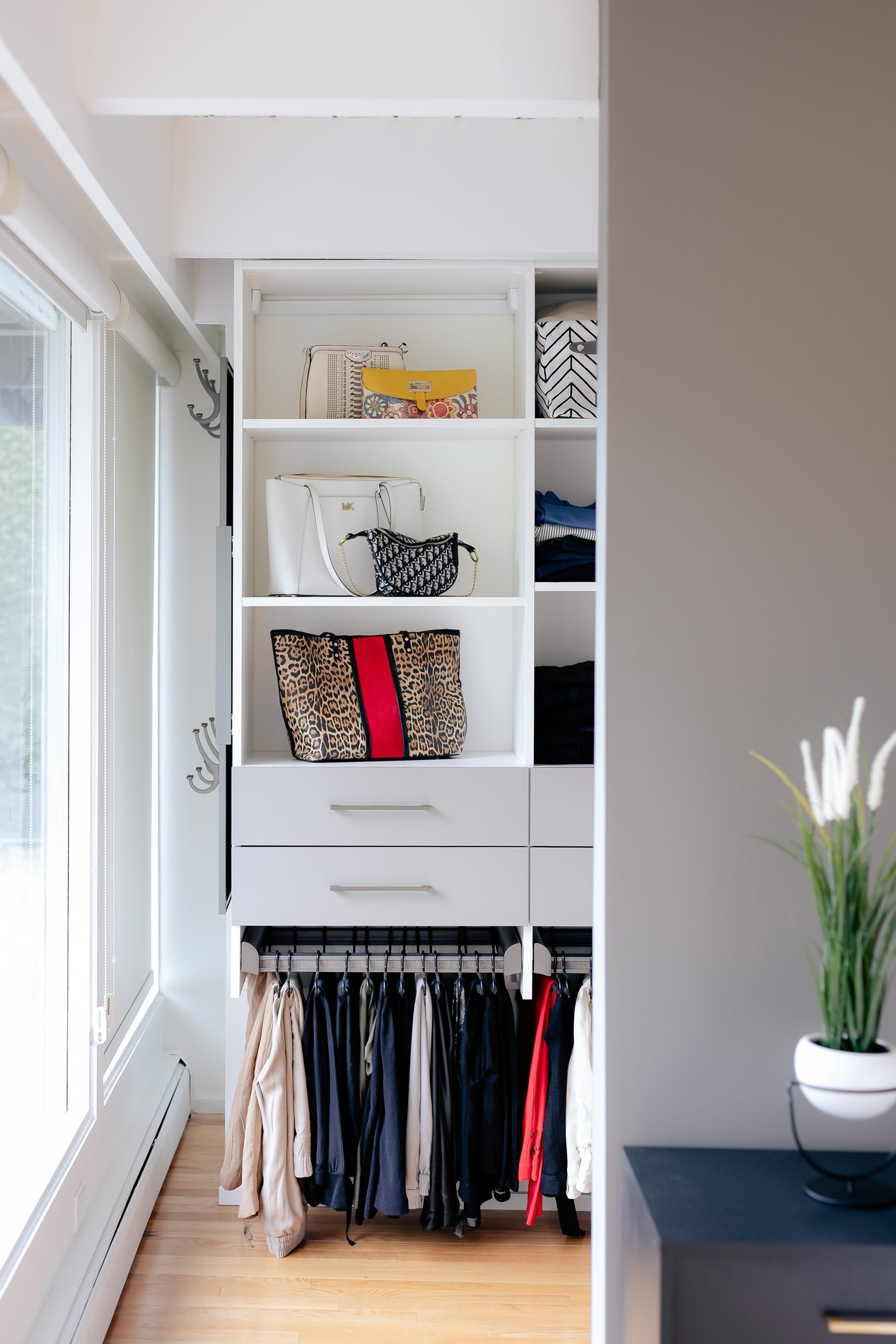 Walk-in closet with open entryway View of walk in closet from outside