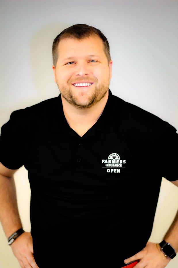 Agent Matt Brown smiles at the camera