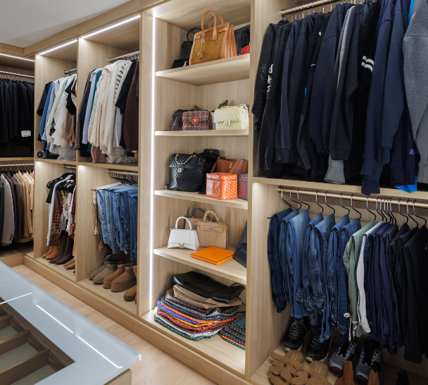 Classic Oak Walk-in Closet California Closets Rockland County New York Custom Luxury Modern Walk in Closet with LED Partition Lighting Double Hanging maximize storage space Open Shelving Storage concept floor to ceiling