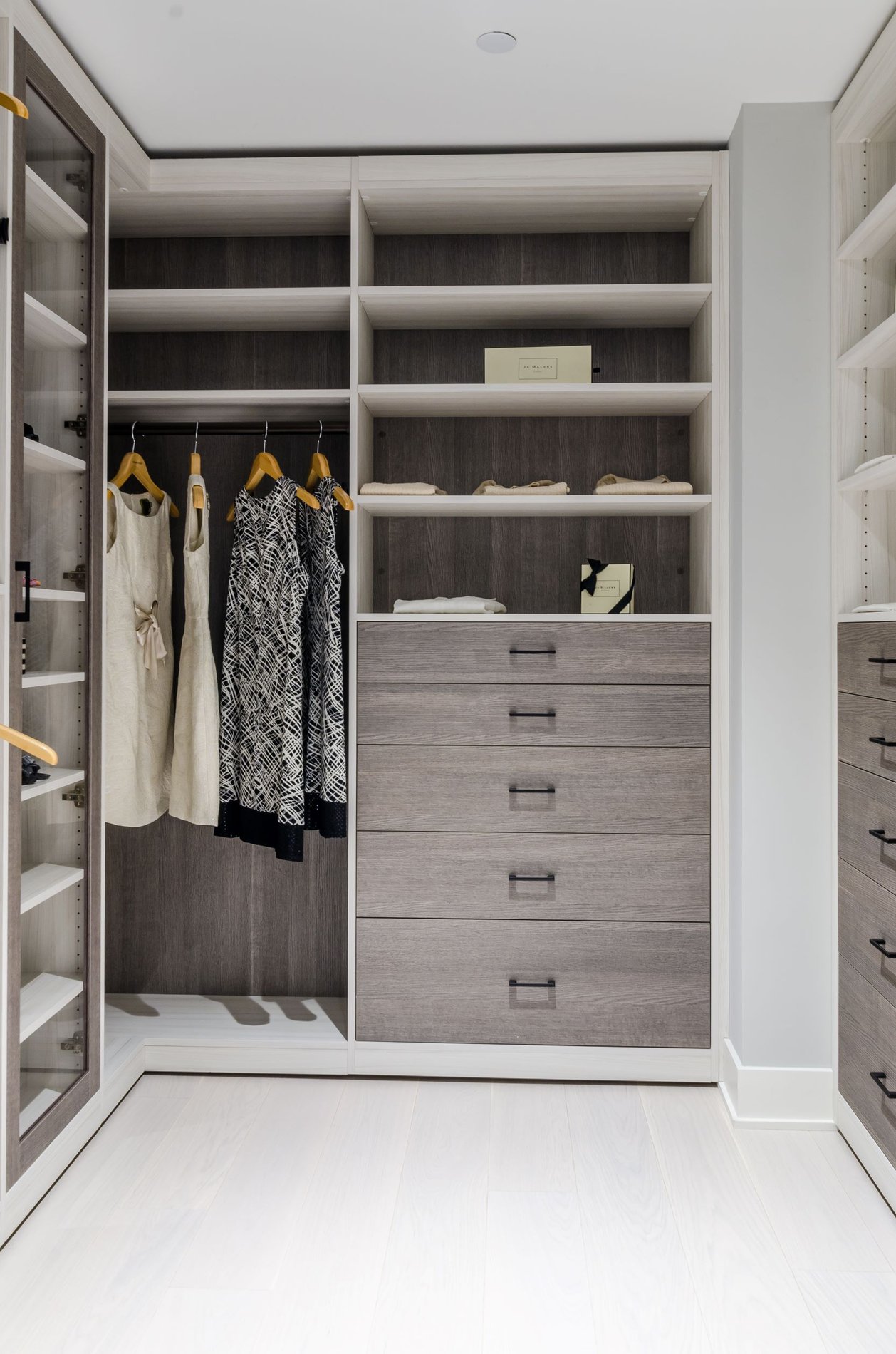 Modern Westchester Walk-In Closet white and gray two tone walk-in closet bronze handles hanging  and shelving california closets new york westchester