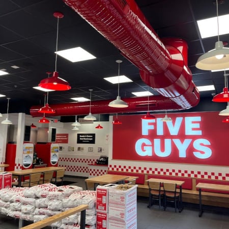 Photo of the dining room of the Five Guys restaurant at 4971 Tuttle Crossing Boulevard in Dublin, Ohio.