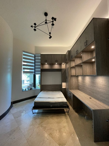 Office and murphy bed Office with a pull down murphy bed. Lots of lighting and desk space.