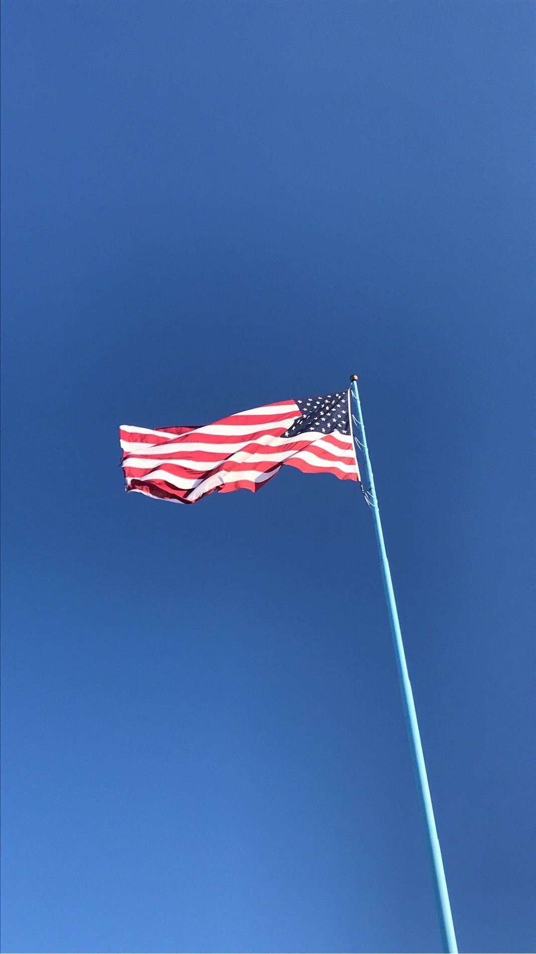 In honor of all who have served and do serve, The Fillipi Agency's flag flies proudly and can be seen from a far in North Pole.
