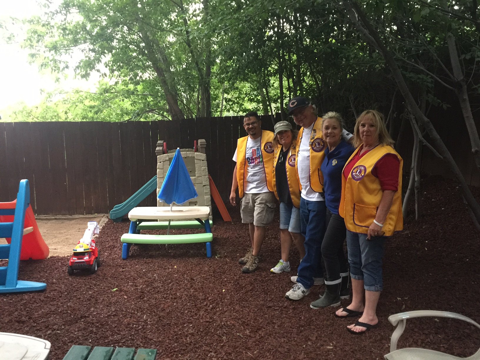 We raked, weeded, trimmed trees and shrubs and planted flowers and plants.