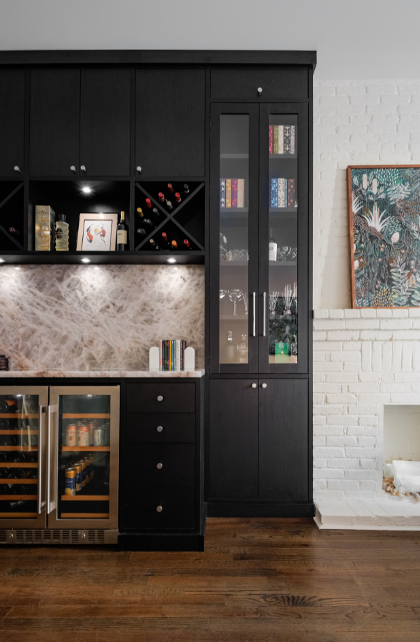Luxury Wine Bar California Closets New City Rockland County NY Black Home Bar Custom Home Bar Custom Wine Bar Wine Fridge built in clear glass doors for dining and glassware storage custom chrome hardware marble countertop