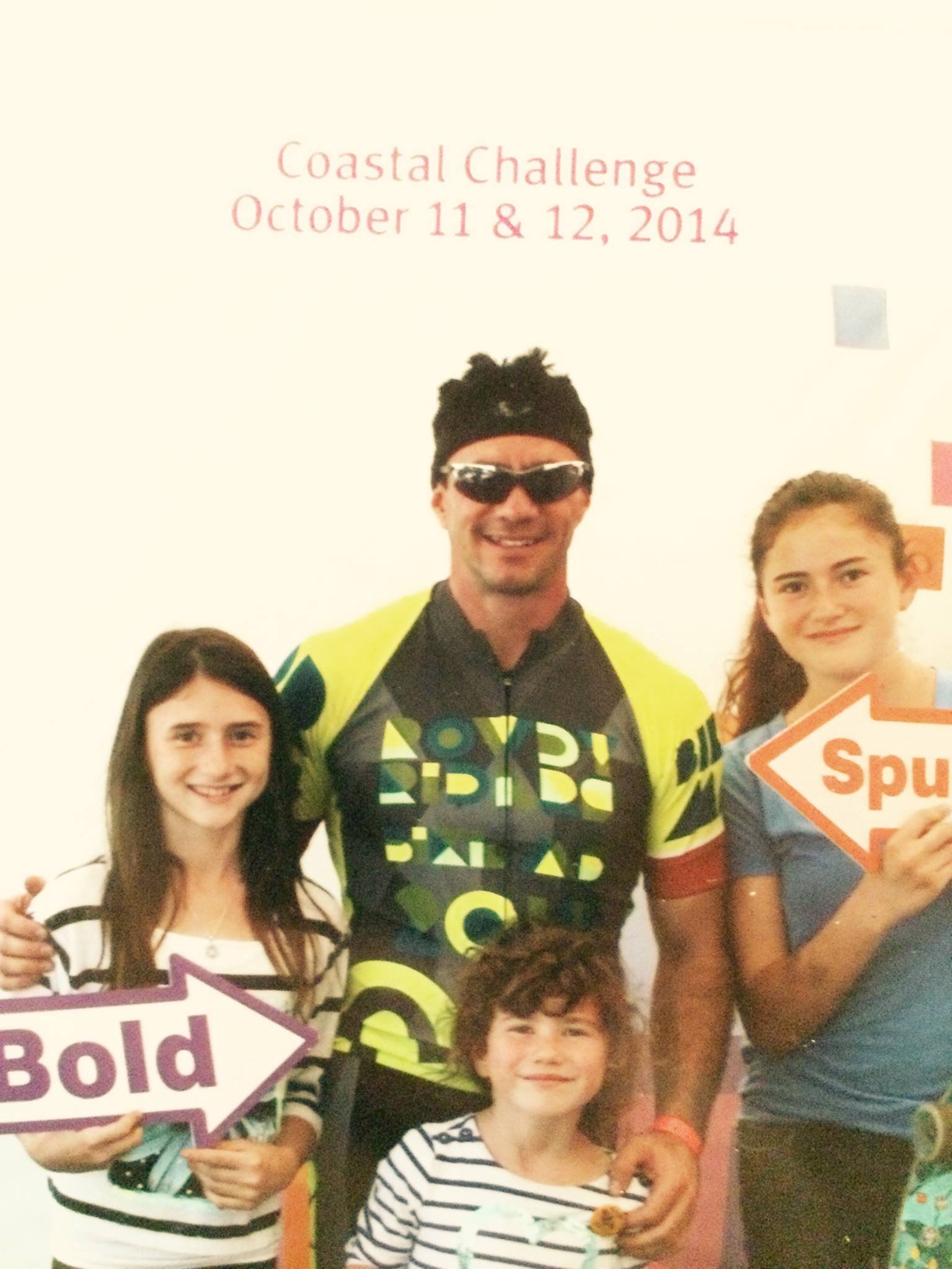 The end of Bike MS 100 mile century ride. My 3 daughters next to me. Charity ride