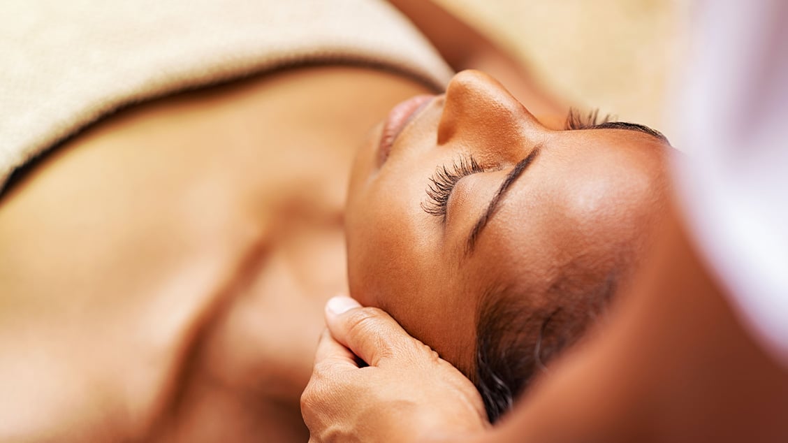 women getting a facial