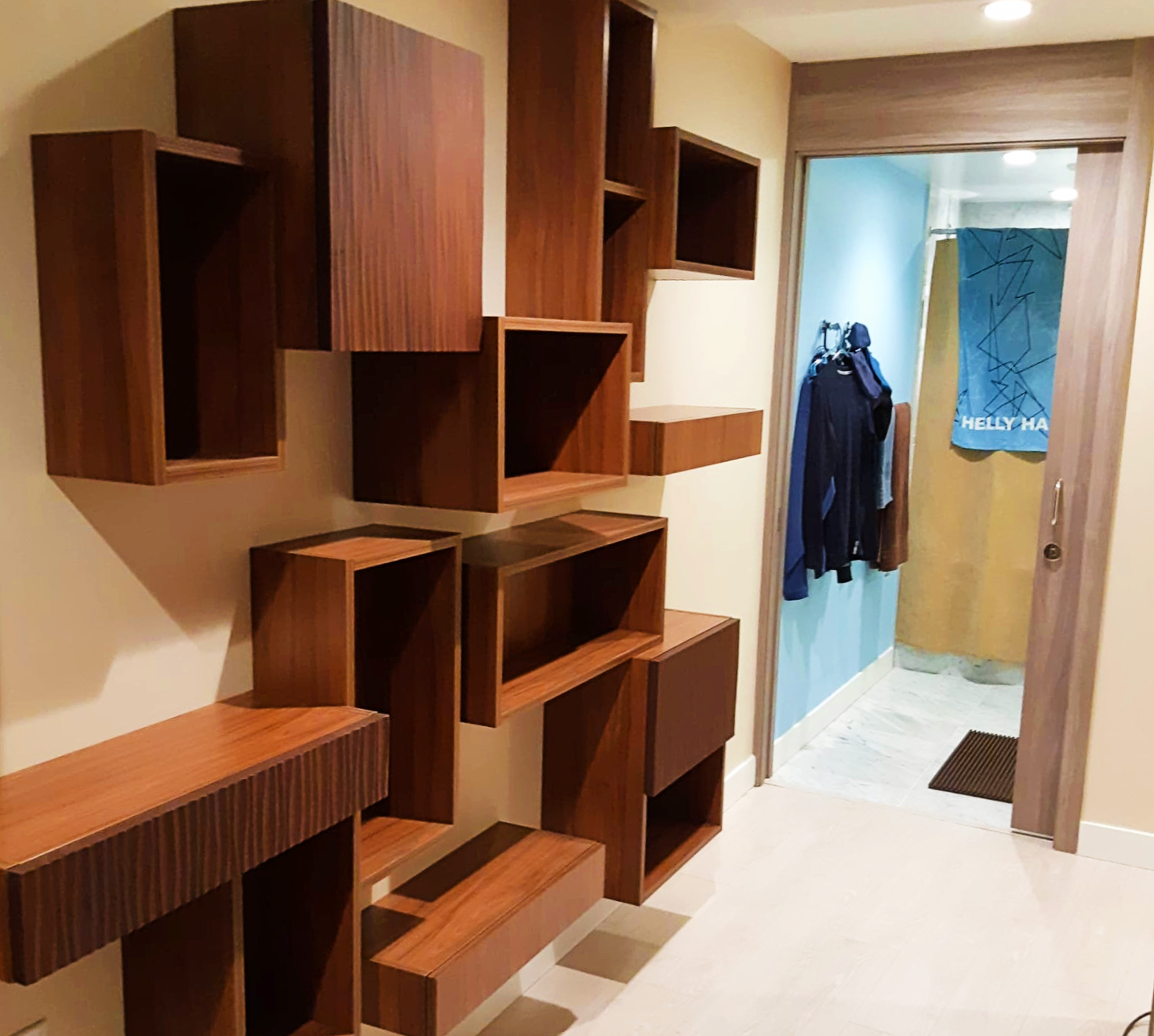 Floating shelves and cubbies an arrangement of floating shelves and cubbies for storage and display