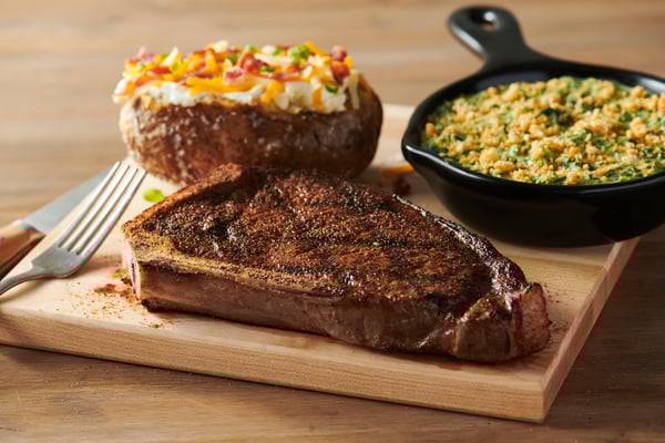 Sirloin with broc and pot in background