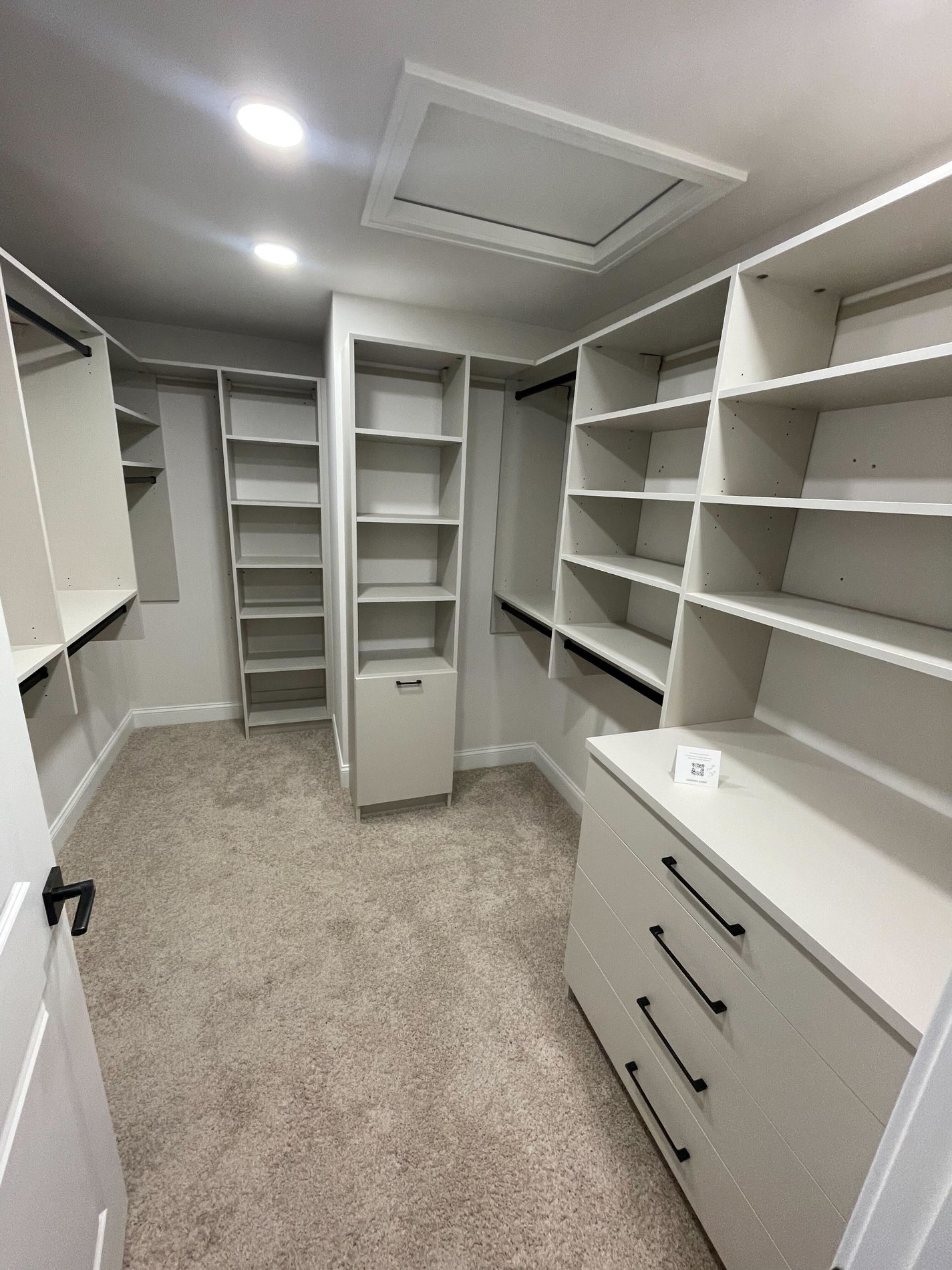 Custom Walk-In Custom Walk in closet with a light, attic access, and a countertop