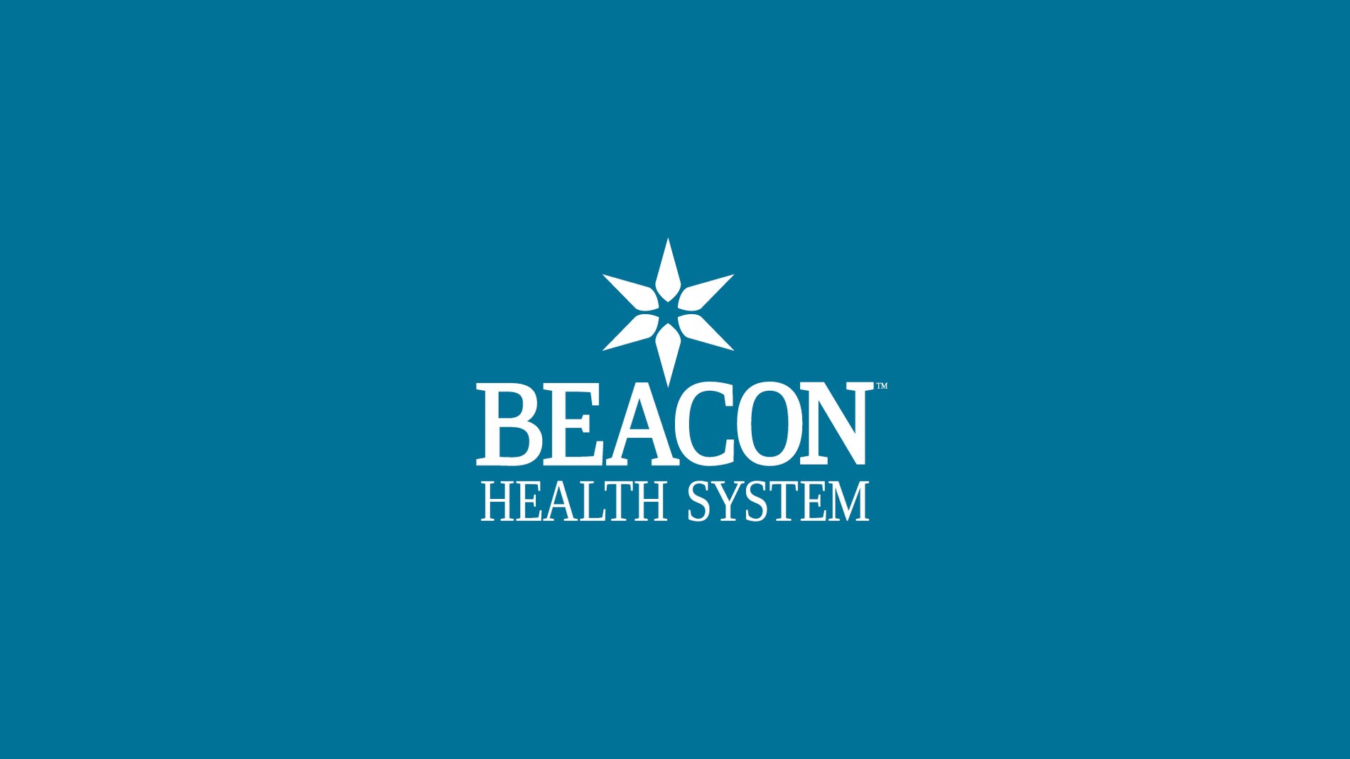 Beacon Health System white logo on teal background with star icon.