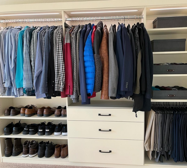 Bedroom Closet Bedroom closet with hanging space, storage drawers, and shelving.