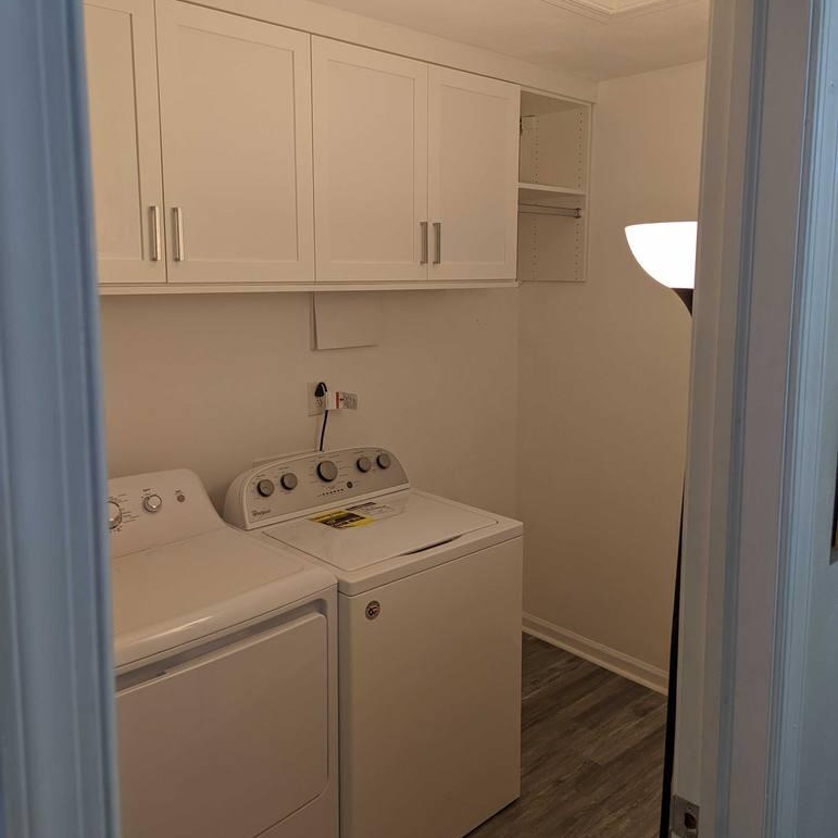 Laundry Room Cabinets Above Washer and Dryer Laundry room cabinets, installed above the washer and dryer.