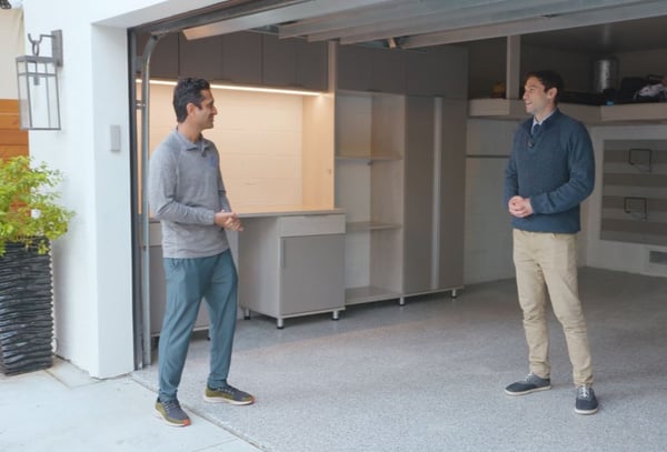 Garage Makeover for Doctor After picture of customizable grey cabinet system in a garage
