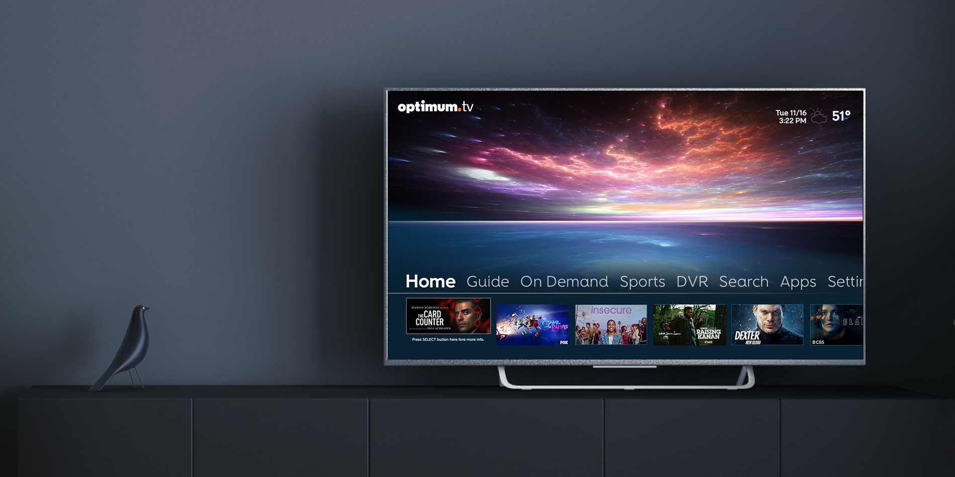 Photo of an Optimum TV connected screen in a living room, displaying viewing options
