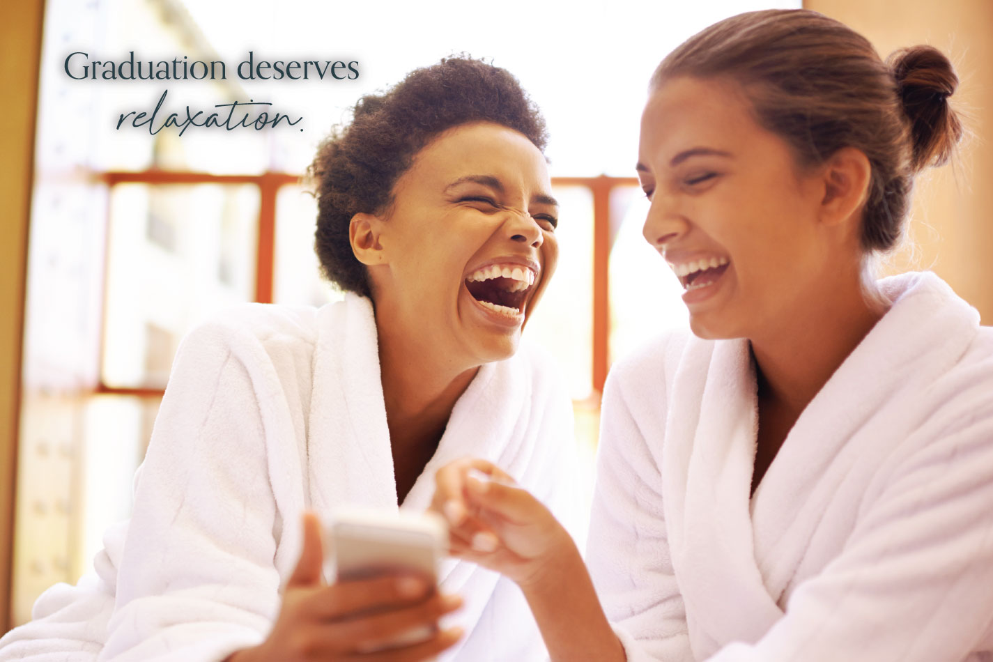 Recent graduates relaxing in spa robes