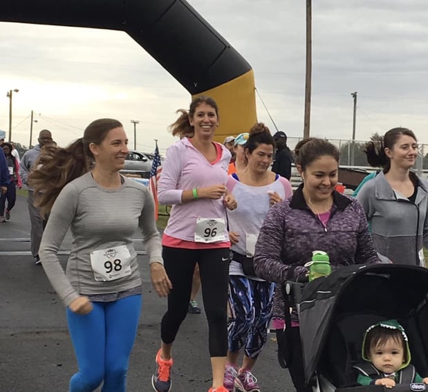 Agency owner Chritine Angles running in the 5k benefiting Virginia Family Services
