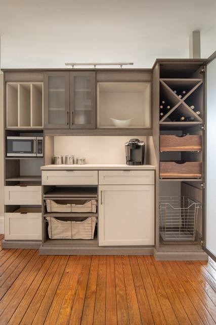 Modern Updated Pantry with Wine Storage A modern pantry with wine storage by California Closets Charlotte, North Carolina.