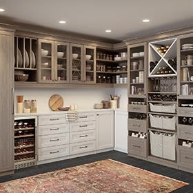 Four organization tips to create your dream kitchen Modern two toned custom pantry with cabinets and other storage by California Closets Northern Michigan