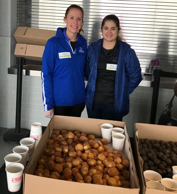 Jennifer and Jaclyn serving a tasty treat at Dunkin Donuts Stadium for the 14th Annual HARC at the Park: Family Walk and Roll event