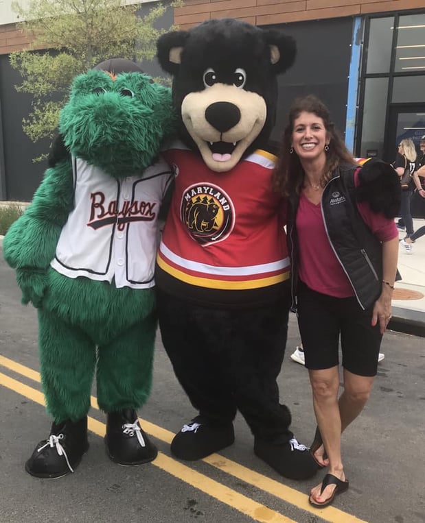 Christine Angles with mascots at DC United Match