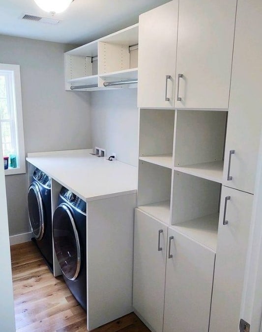 White Laundry Room White laundry room with counter, hanging space, and open and closed storage.