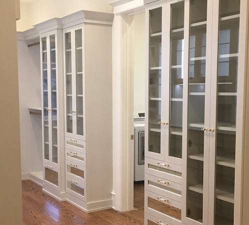 Closet with Glass Door Fronts