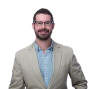 A headshot of Goosehead agent Greyson Deal
