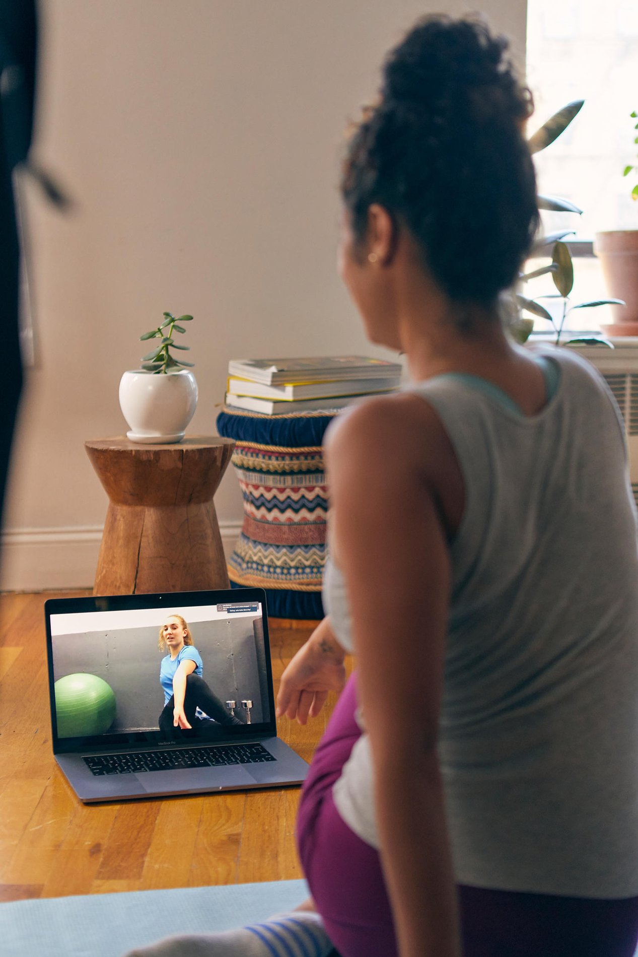 Female member working our virtually with blink trainer