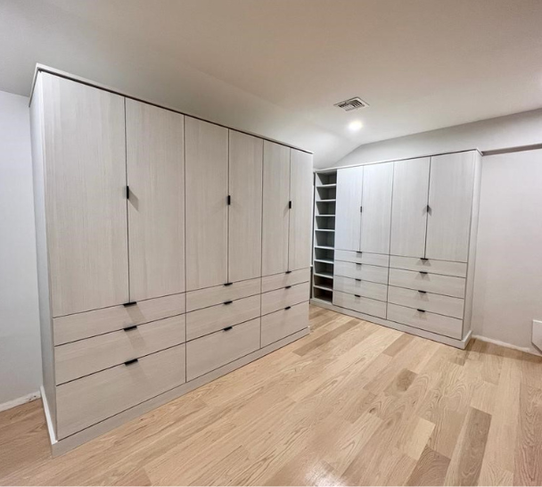 Simple and Sleek White Closet Cabinetry California Closets Long Island City NY walk in closet design custom closets closet designers designer closets closet shoe storage built-in closets closet systems closet drawer organization closet shelf organizer