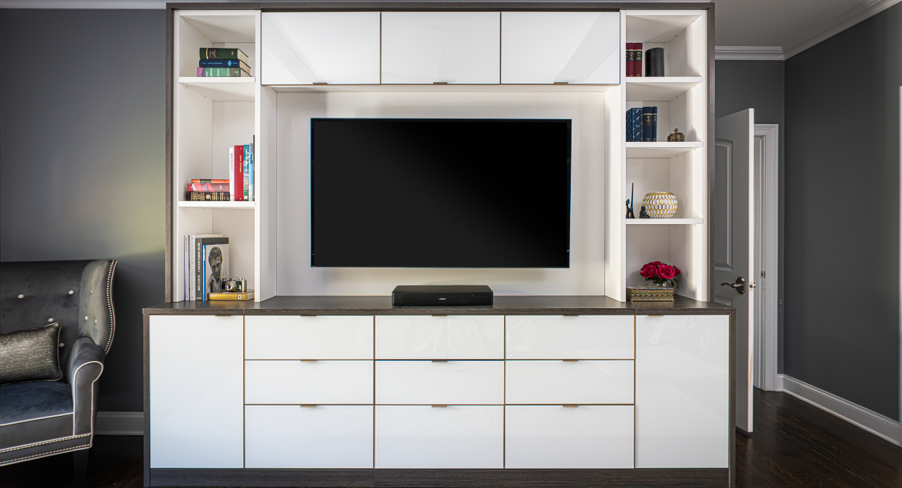 Black & White Media Center California Closets Westchester New York Custom Black and White Entertainment Center with White Drawers and Custom Bookshelves on either side of TV