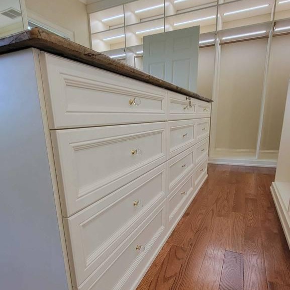 Walk-In Closet with Island Greensboro - Custom closets - Walk-in closet with a center island filled with drawers