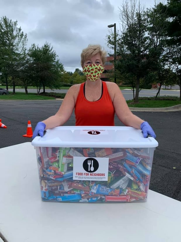 Here's our Michelle volunteering with the Food for Neighbors Red Bag program.