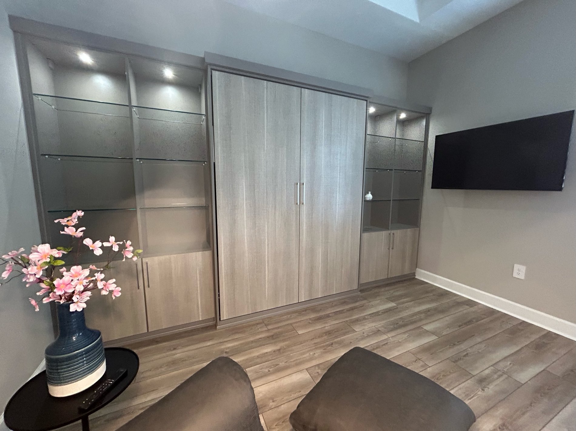 Sleek Wall Bed in Pietra with Glass Shelves & LED Lighting WALL BED in PIETRA with GLASS SHELVES and LED lighting