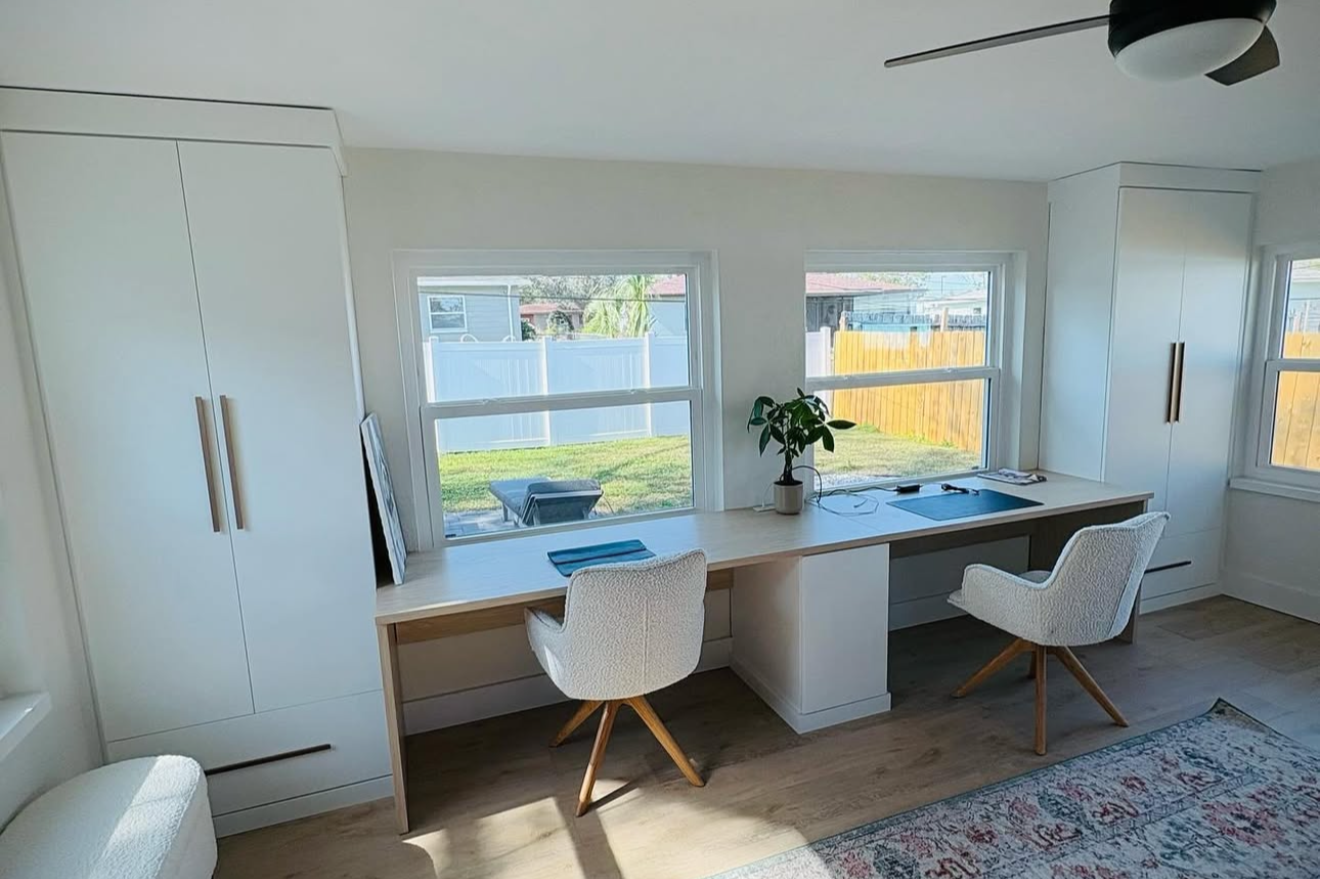 Calm & Functional Double Desk Workspace with Dove Finish and Natural Countertops Double desk workspace featuring Dove finish, natural countertops, and Paxton hardware.