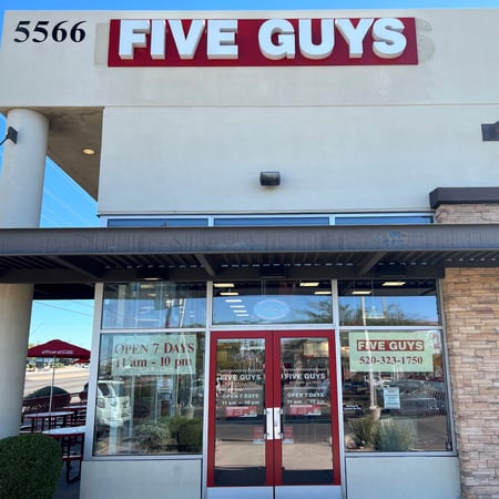 Entrance to the Five Guys restaurant at 5566 East Broadway Boulevard in Tucson, Arizona.