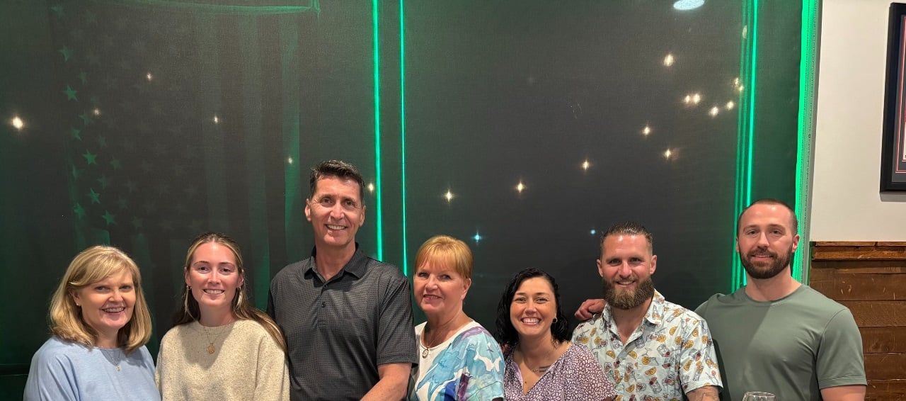 Team dinner celebrating Debbie's 25th anniversary