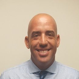 Oscar Vega, Insurance Agent