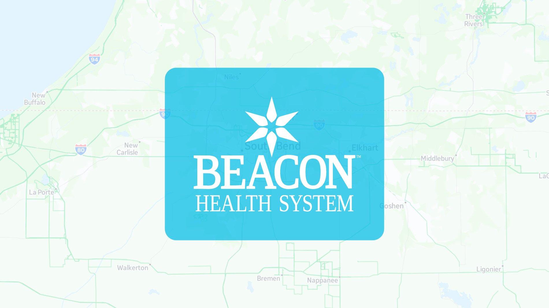 Beacon Health System white logo on teal background with star icon placed over a map of South Bend Indiana.