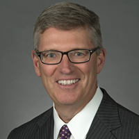 "Charlie Mueller, Group Managing Director"