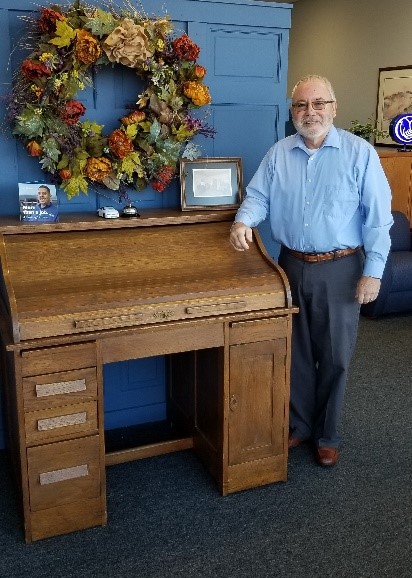 The rolltop desk that Talbird’s grandfather started his lumber yard business with in 1912 greets customers as they enter the Lovan Insurance Agency