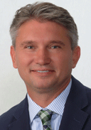 Elliot Cowey, Insurance Agent